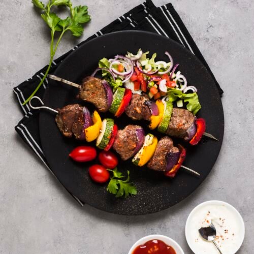 delicious-arabic-fast-food-skewers-black-plate