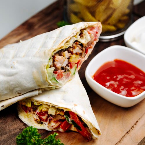 doner wrapped in lavash with side fries and ketchup